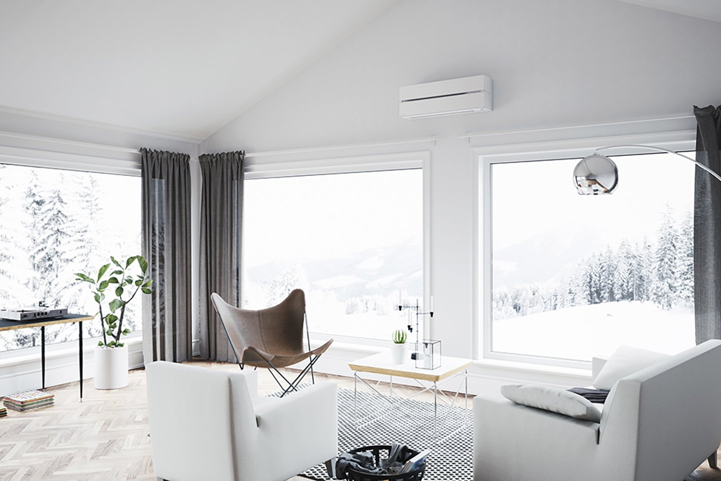 Lyst og moderne oppholdsrom med vegghengt varmepumpe over vinduet.