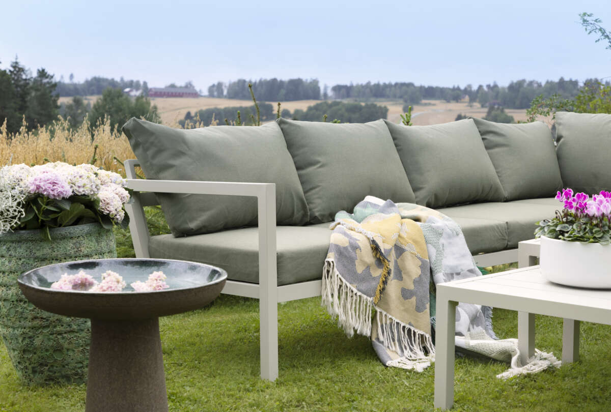 Røst hjørnegruppe kalk og grønne vanntette putetrekk