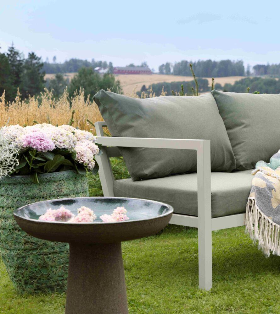 Røst sofagruppe kalk og grønne vanntette putetrekk