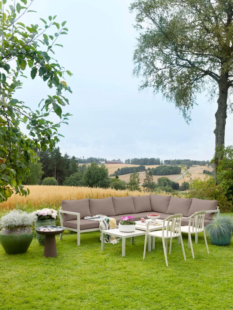 Røst hjørnegruppe kalk og brune vanntette putetrekk