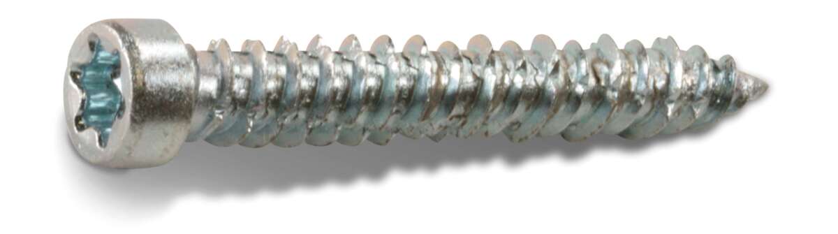 Fast betongskrue for karmhylse