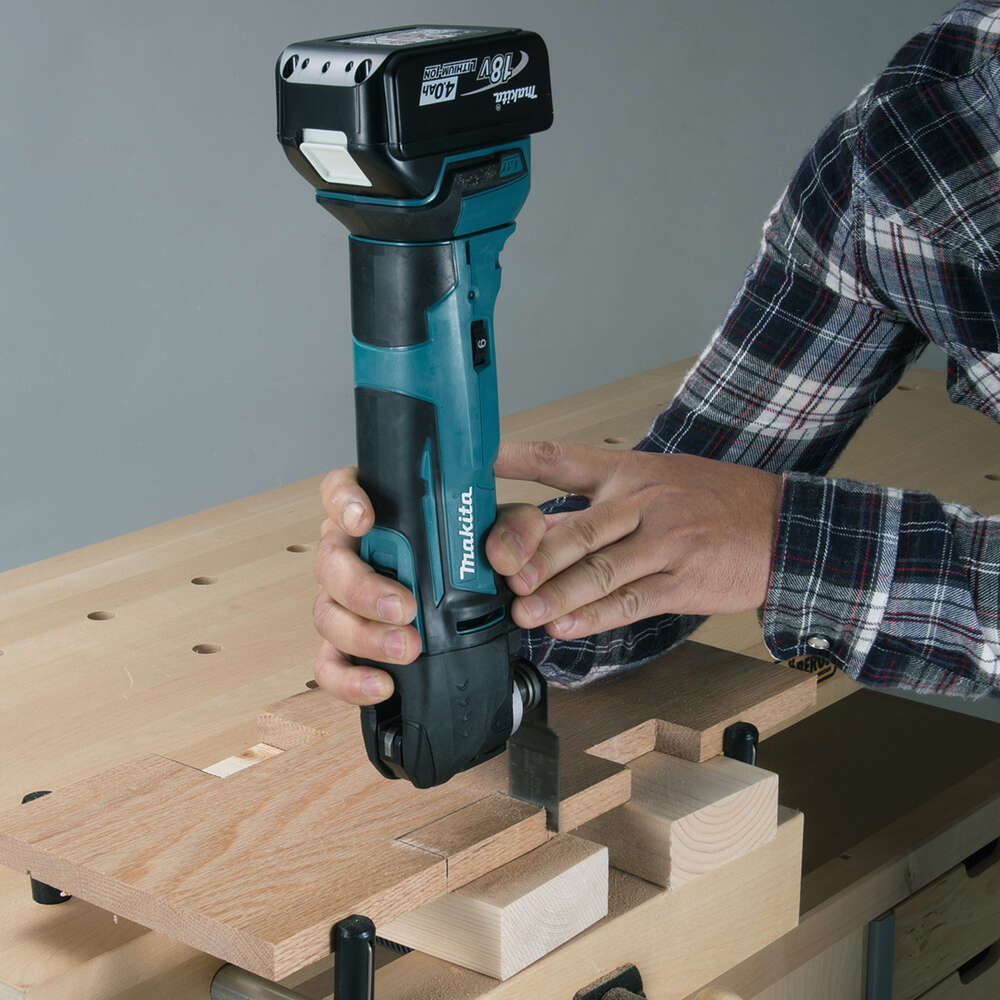 Makita Multiverktøy DTM51ZJX1
