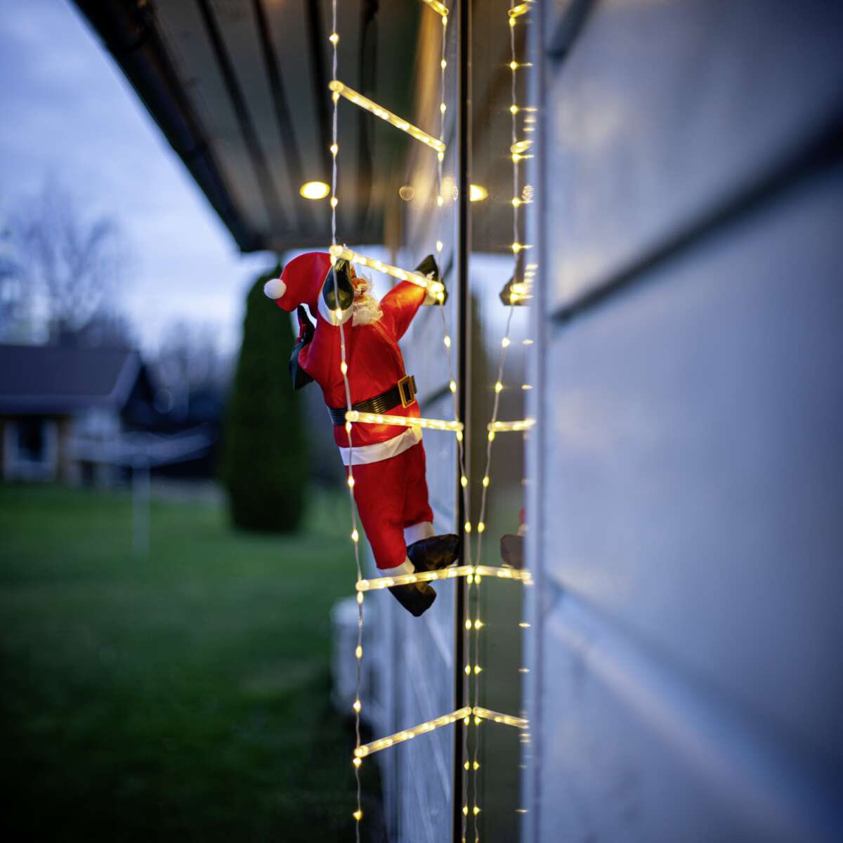 Ladde LED-lys nisse i stige