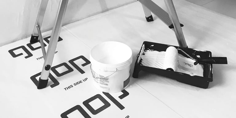 Malespann med malerulle på isocover fra gop